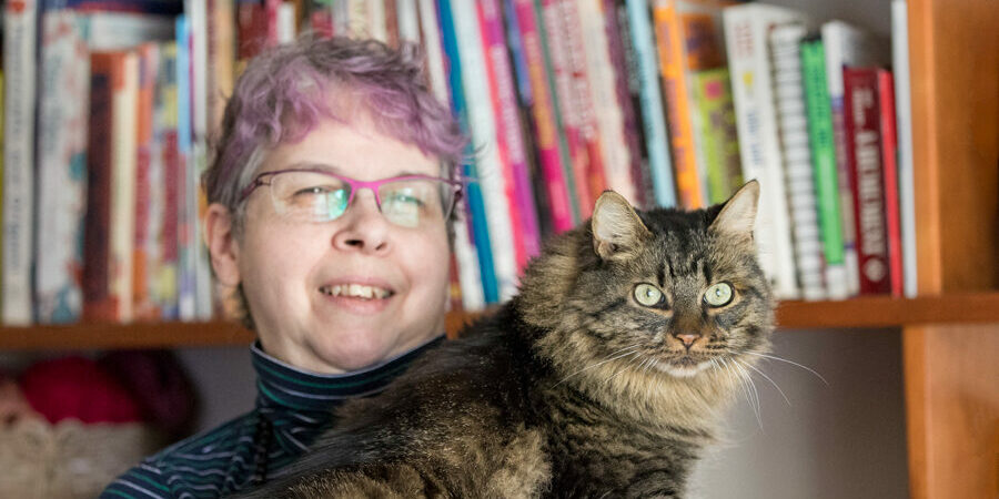 The editor and her cat "Fats" (named in honor of the Blues legend, Fats Domino). Photo credit by Nell Garrett.